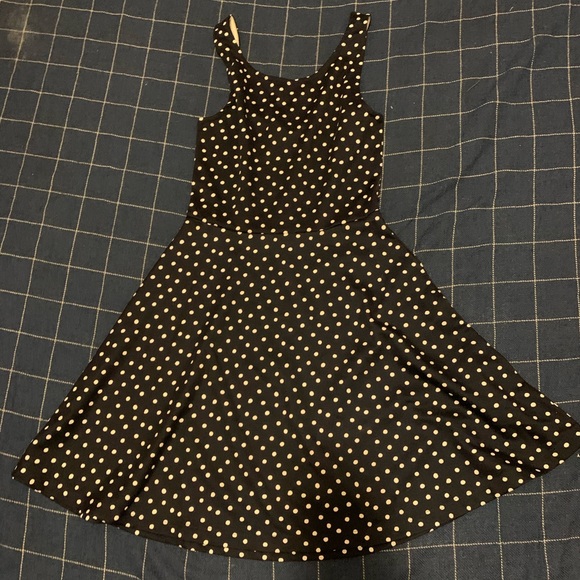 Navy polka dot H&M sundress size 4. Scoop back. - Picture 1 of 3